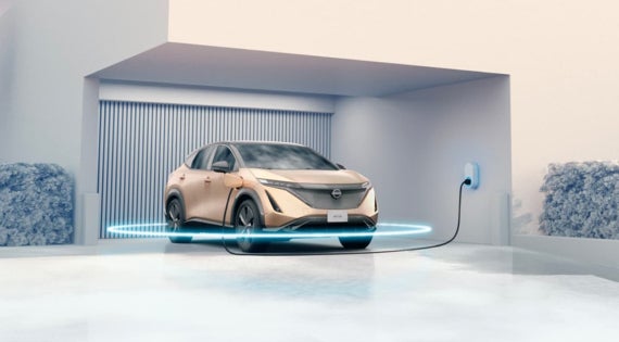 Nissan ARIYA charging at home with a blue ring circling the vehicle | Dutch Miller Nissan Of Bristol in Bristol TN