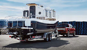 2022 Nissan TITAN Truck towing boat | Dutch Miller Nissan Of Bristol in Bristol TN