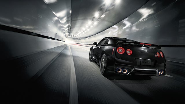 2023 Nissan GT-R seen from behind driving through a tunnel | Dutch Miller Nissan Of Bristol in Bristol TN